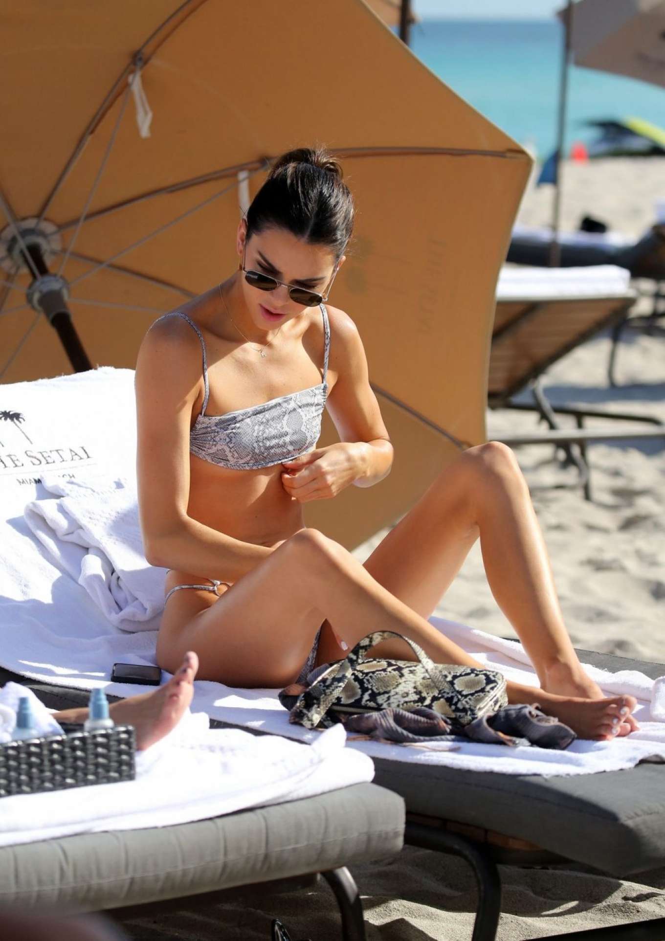 Kendall Jenner in Animal Print Bikini on the beach in Miami. 