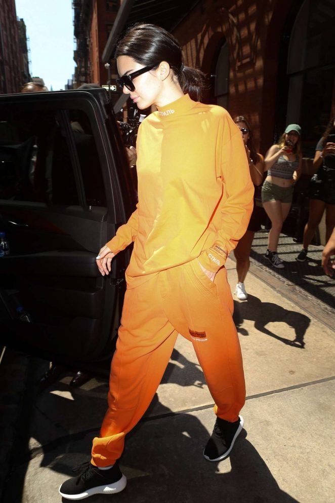 Kendall Jenner in Orange Leaving her hotel -03 | GotCeleb