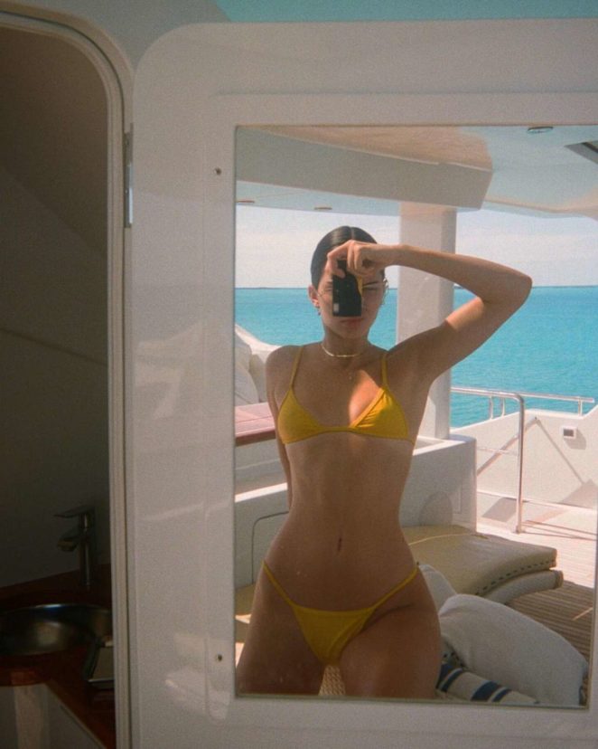 Kendall Jenner in Yellow Bikini on boat