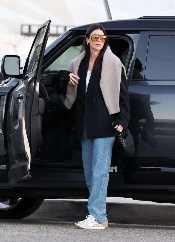 Kendall Jenner - Wearing Bottega Veneta and oversized orange lens glasses while out in LA