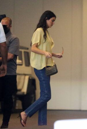 Kendall Jenner - With Hailey Bieber in jeans as they visit a friend's home in Miami