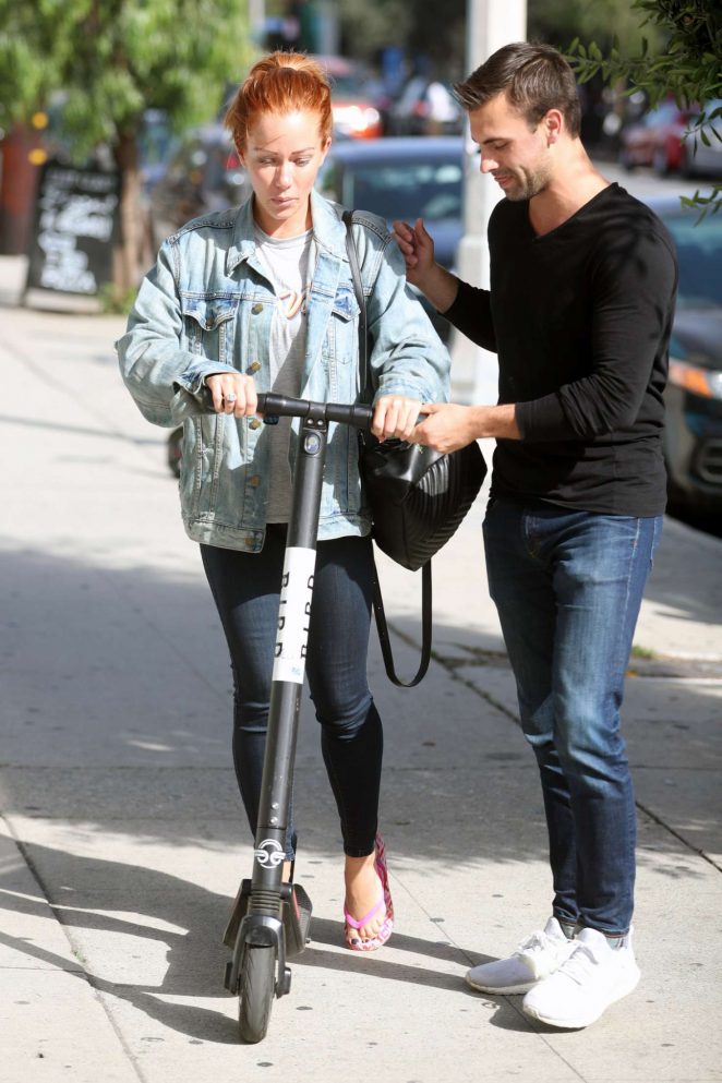 Kendra Wilkinson rides a scooter in West Hollywood