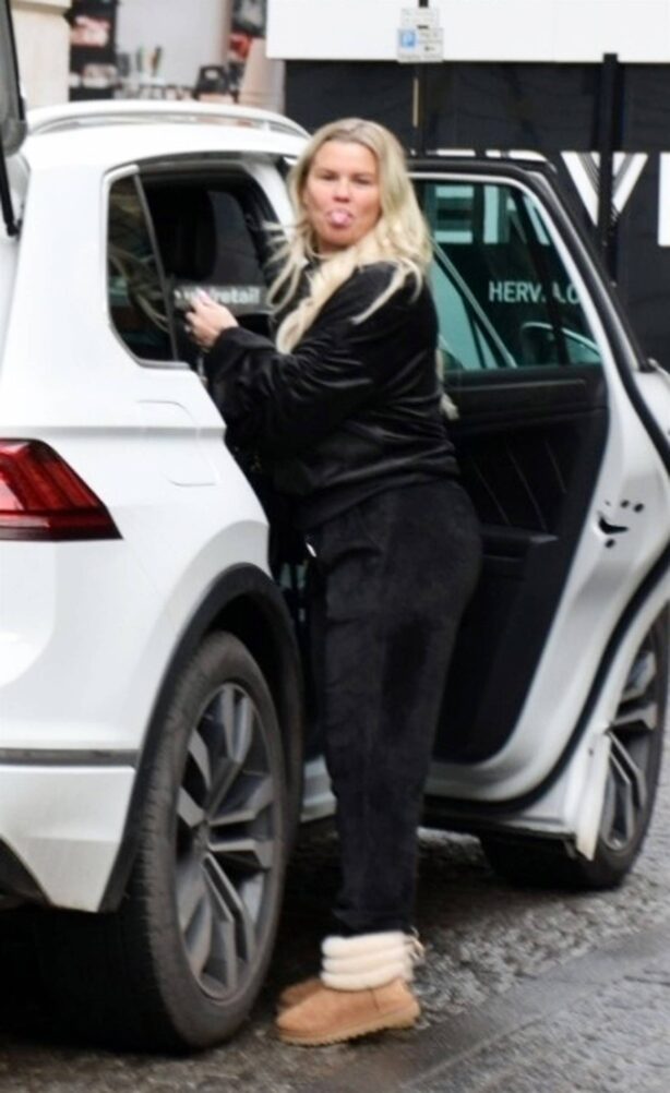 Kerry Katona- In a black Velour tracksuit with her partner Ryan Mohoney in Manchester