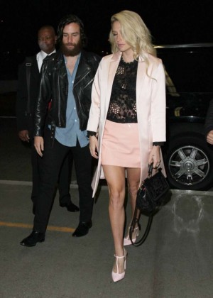 Kesha in Mini Skirt at LAX Airport in LA