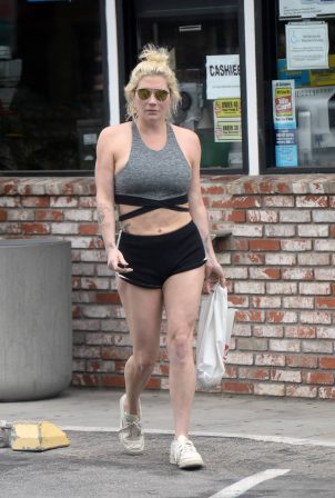 Kesha - In black shorts and white trainers in Los Angeles