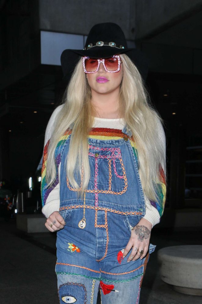 Kesha in Jeans Arrives at LAX Airport in Los Angeles