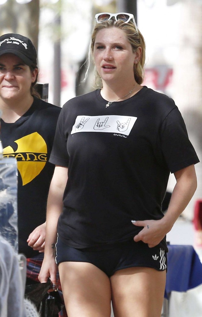 Kesha in Shorts Shopping in Cannes