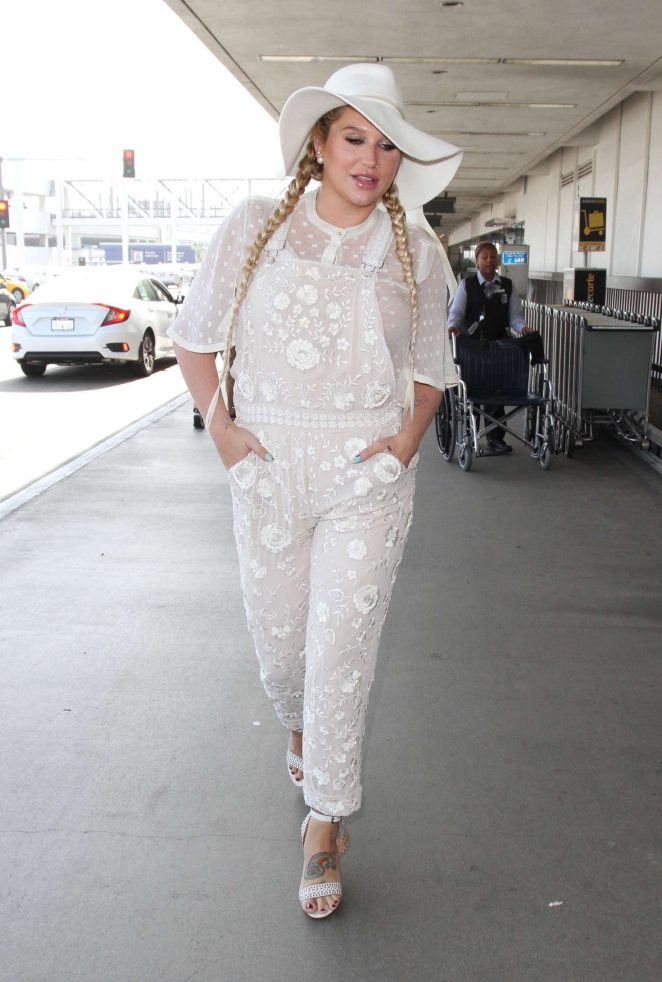 Kesha in White at LAX Airport in Los Angeles