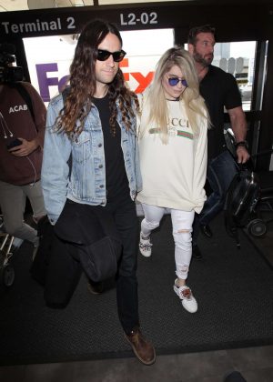 Kesha with her boyfriend Brad Ashenfelter at LAX airport in LA
