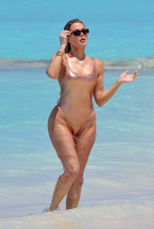 Khloe Kardashian - In metallic one-piece swimsuit on vacation in the Turks and Caicos