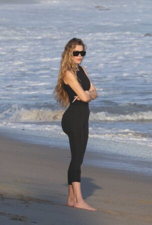 Khloe Kardashian - In Swimsuit on the beach in Malibu