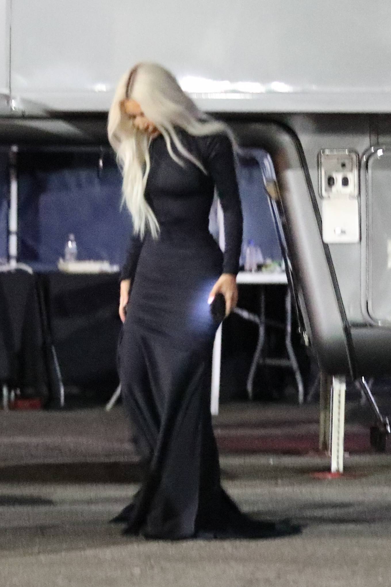 Kim Kardashian 2022 : Kim Kardashian – In a skin-tight steel colored ensemble shoots a commercial for Hulu in LA-18