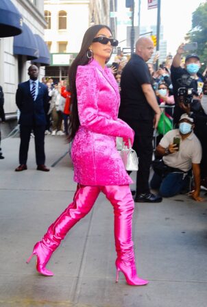 Kim Kardashian - In burning eyes pink Balenciaga outfit exiting the Ritz-Carlton hotel in New York
