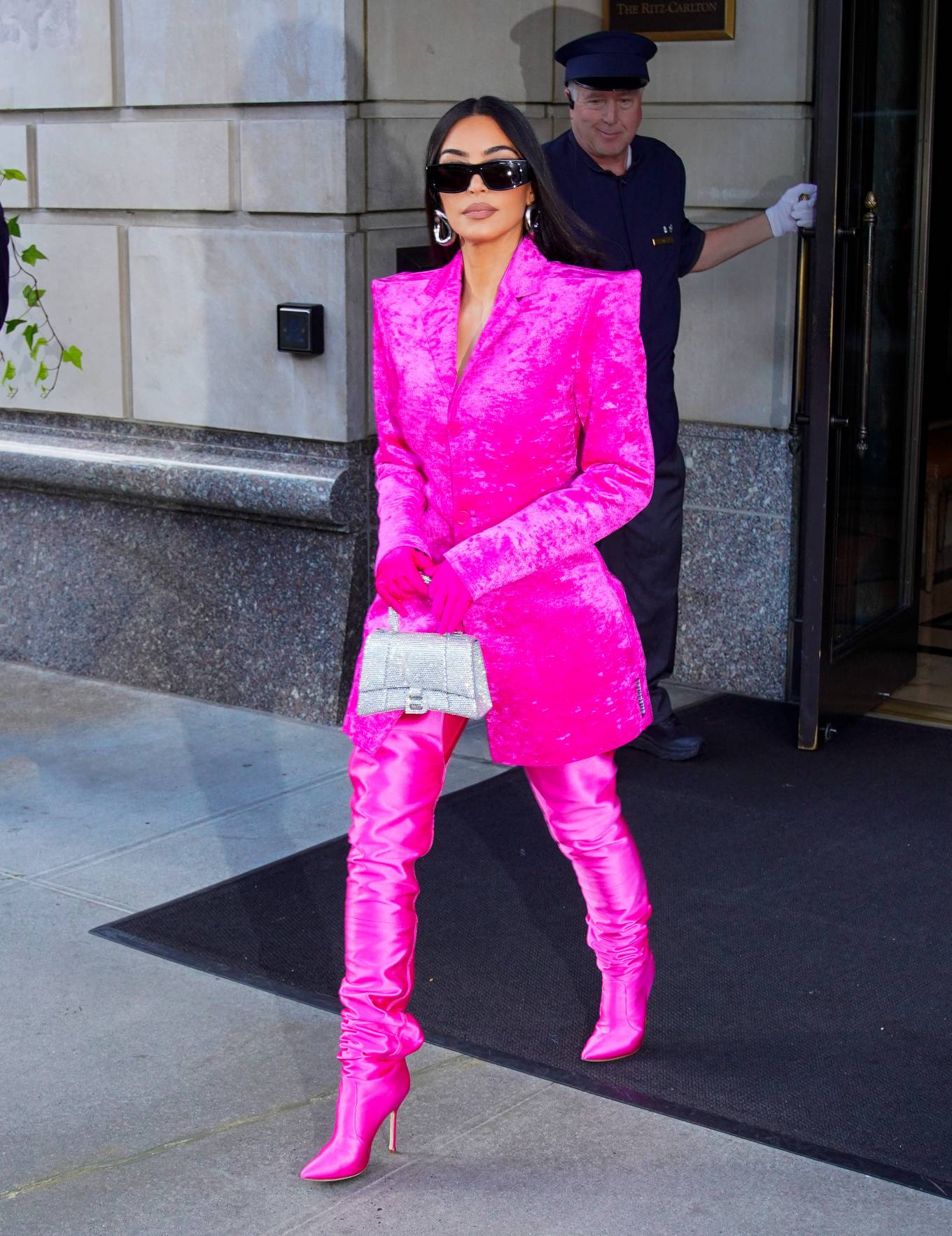 Kim Kardashian - In burning eyes pink Balenciaga outfit exiting the ...