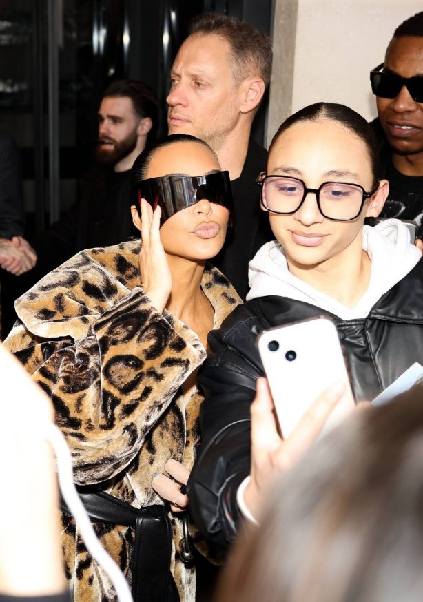 Kim Kardashian - In long fur jacket for dinner at Costes Restaurant in Paris