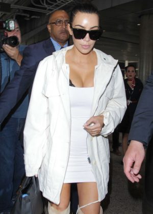 Kim Kardashian in Mini Dress at LAX Airport in Los Angeles