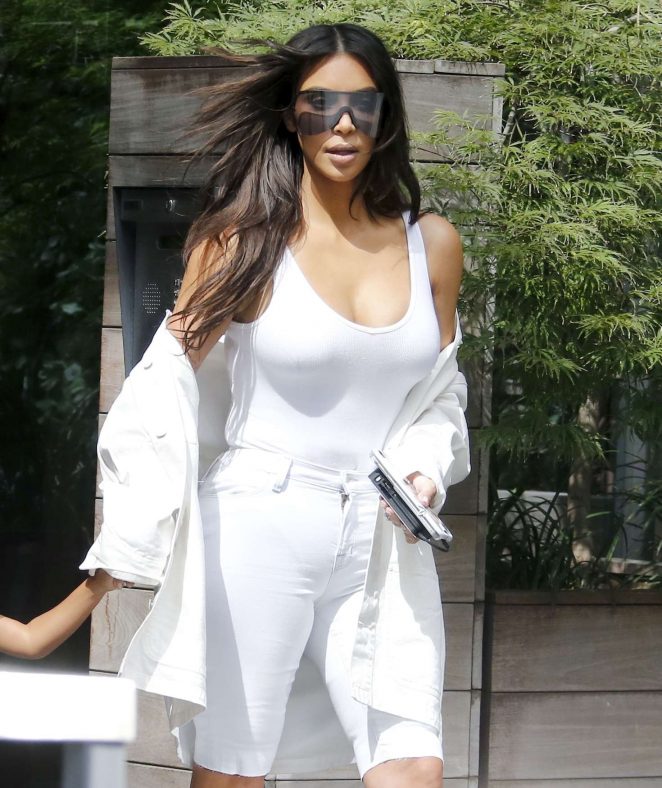 Kim Kardashian in White Leaving her apartment in New York