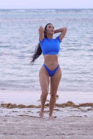 Kim Kardashian - Poto shoot for her SKIMS swimwear line on a tropical getaway