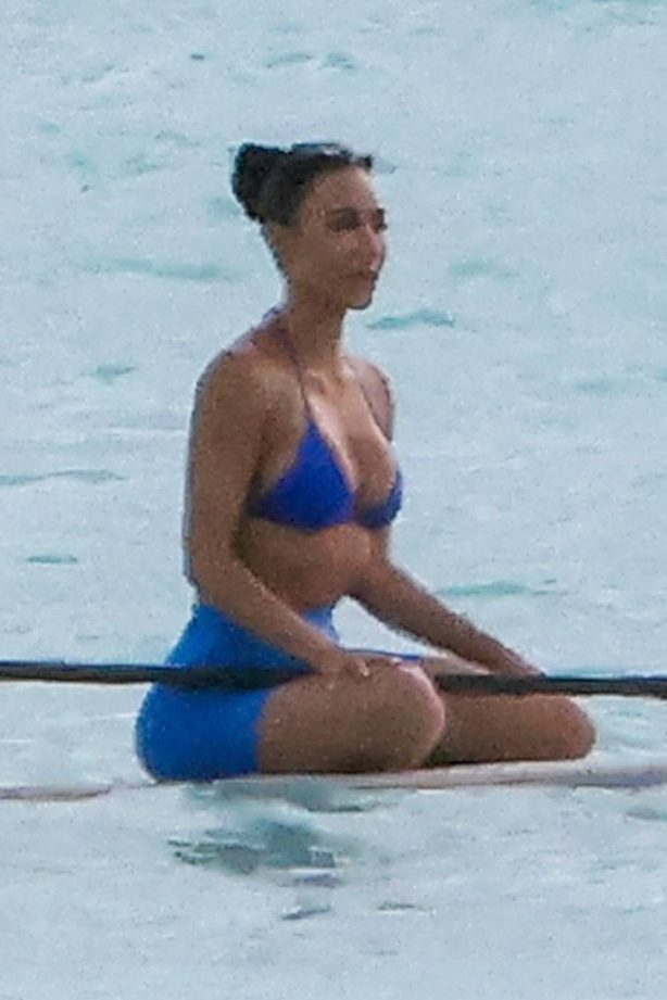 Kim Kardashian - Seen in a blue top bikini at the paddle boarding session in Turks