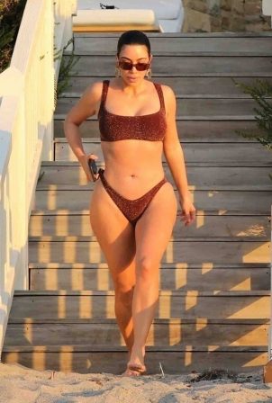 Kim Kardashian - Wearing bikini on the beach in Malibu