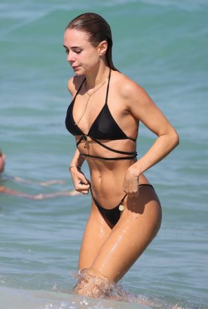 Kimberley Garner - In a black bikini on the beach in Miami
