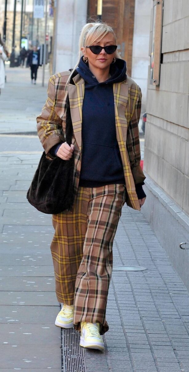 Kimberly Hart-Simpson - Dressed in checked co-ord on the street in Manchester