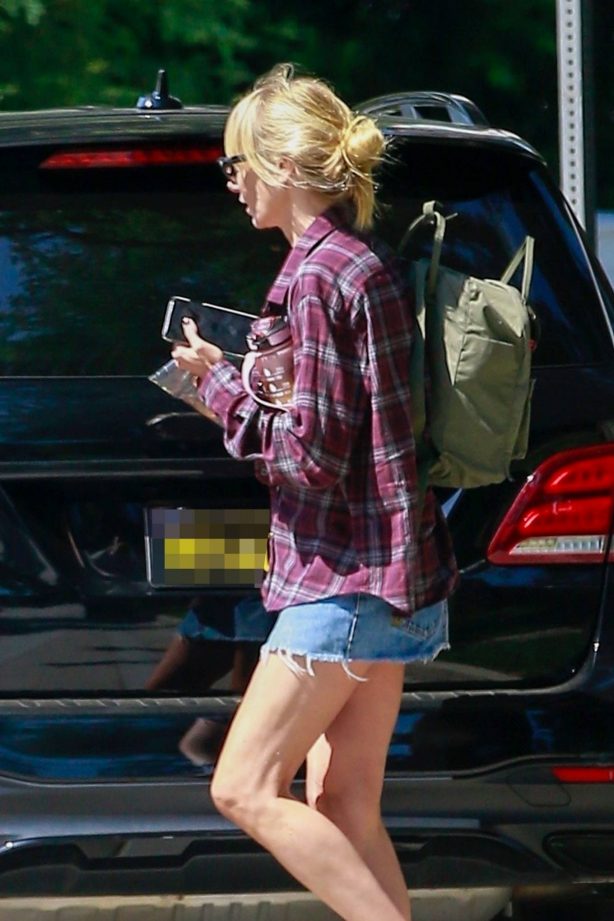 Kimberly Stewart in Jeans Shorts at a friend's house in Studio City