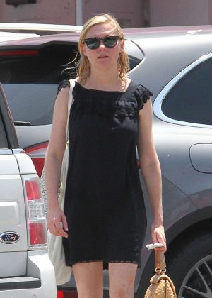 Kirsten Dunst in Short Black Dress out in Los Angeles