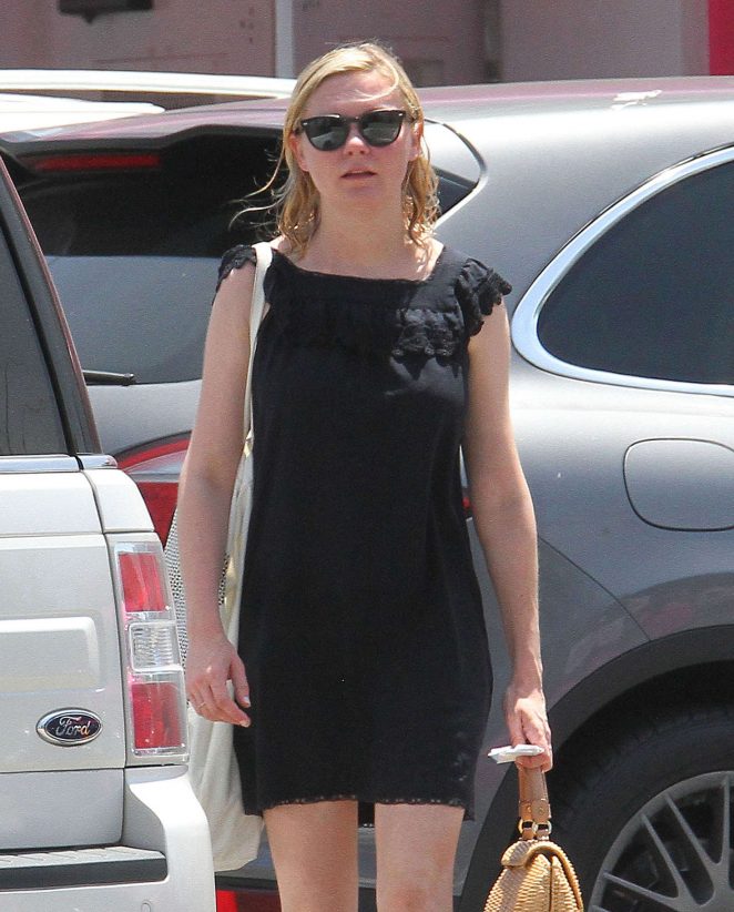 Kirsten Dunst in Short Black Dress out in Los Angeles
