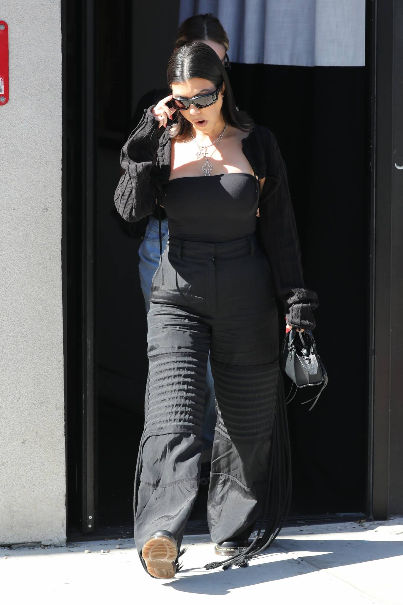 Kourtney Kardashian 2022 : Kourtney Kardashian – In all black at the BooHoo store in West Hollywood-06