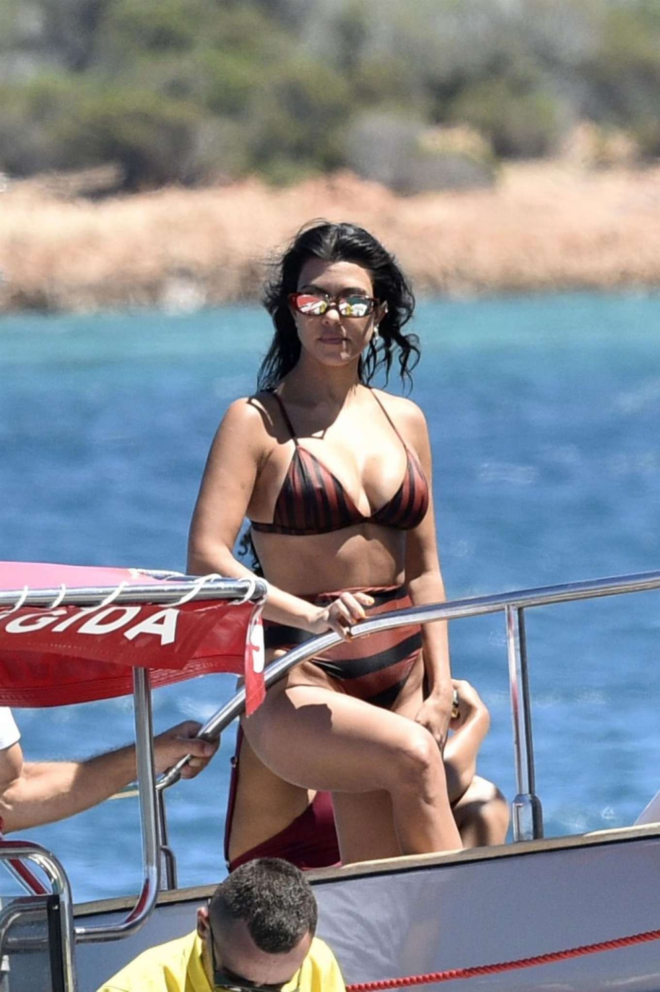 Kourtney Kardashian in Bikini on the yacht in Sardinia