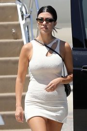 Kourtney Kardashian in Mini Dress - Returns to Los Angeles