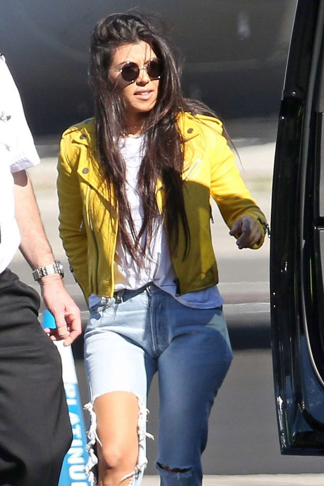 Kourtney Kardashian in Ripped Jeans at Airport in Van Nuys