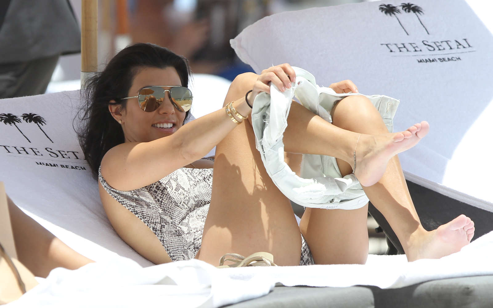 Kourtney Kardashian in Swimsuit on the beach in Miami. 