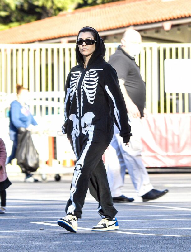 Kourtney Kardashian - Wearing a skeleton onesie while out in Calabasas