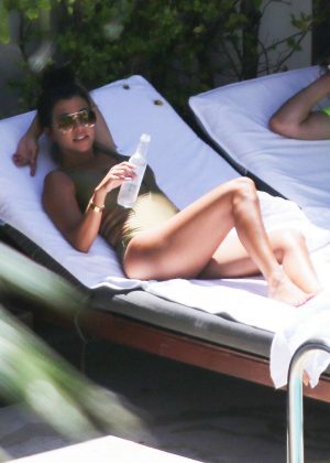 Kourtney Kardashian - Wearing a swimsuit at the pool in Miami