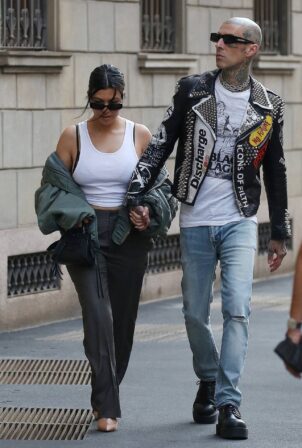 Kourtney Kardashian - With husband Travis Barker holding hands while out in Milan