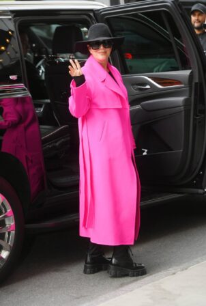 Kris Jenner - In a hot pink trench coat out in New York