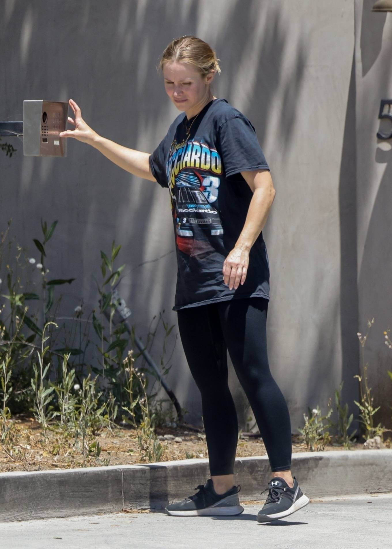 Kristen Bell - Wearing a Daniel Ricciardo tee and black leggings in Los Feliz