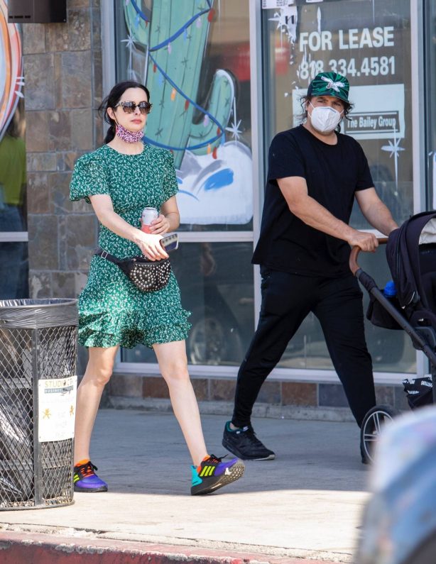 Kristen Ritter - In green dres with her husband Adam Granofsky in Studio City