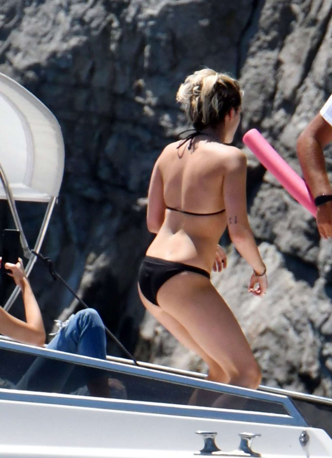 Kristen Stewart in Black Bikini on a yacht in Amalfi Coast. 