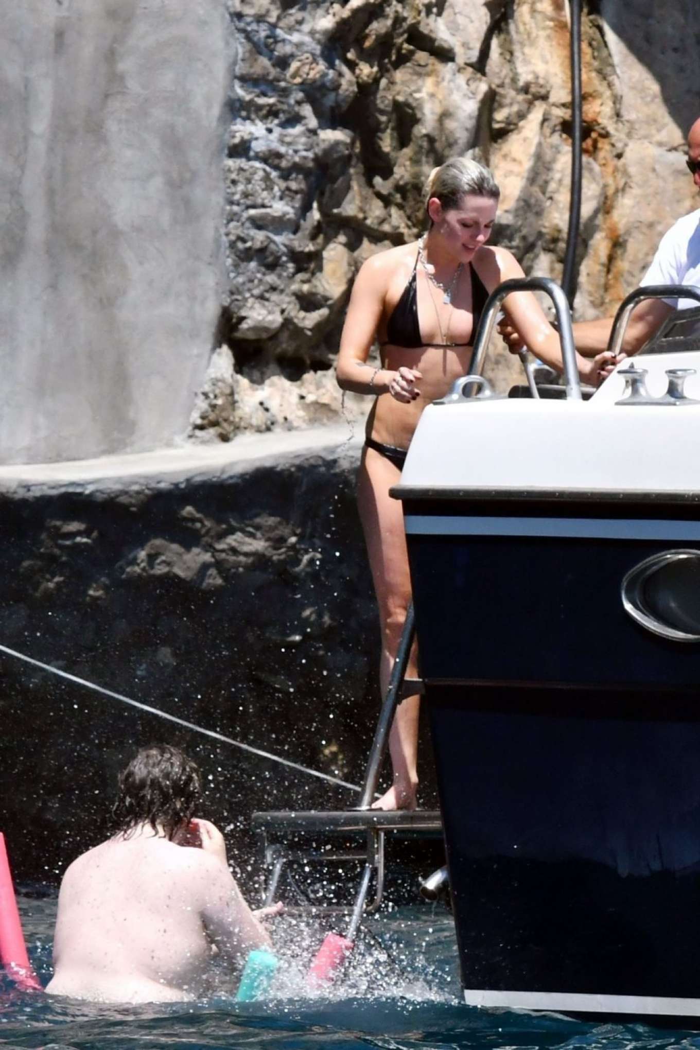 Kristen Stewart in Black Bikini on a yacht in Amalfi Coast