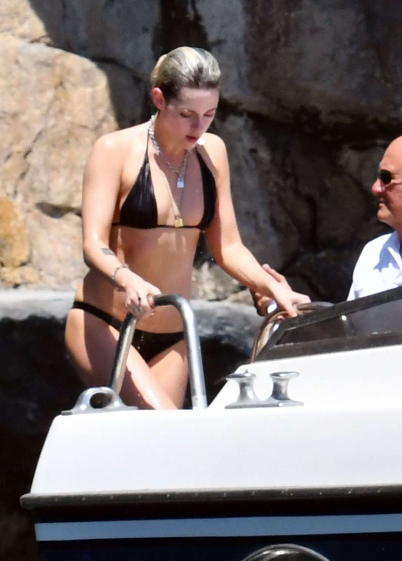 Kristen Stewart in Black Bikini on a yacht in Amalfi Coast. 