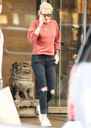 Kristen Stewart in Black Ripped Jeans in New York