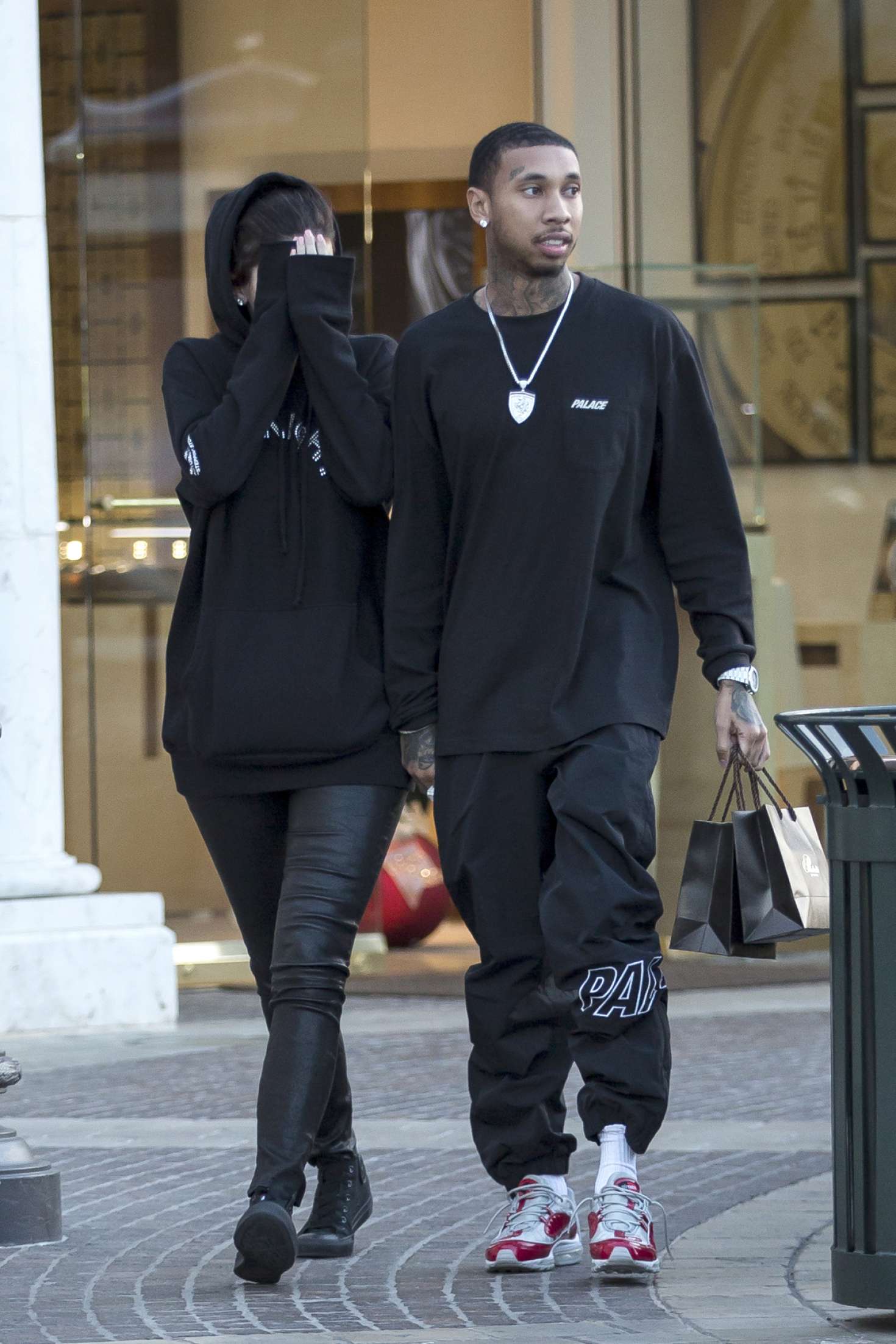 Kylie Jenner 2016 : Kylie Jenner Covers her face with Tyga -01