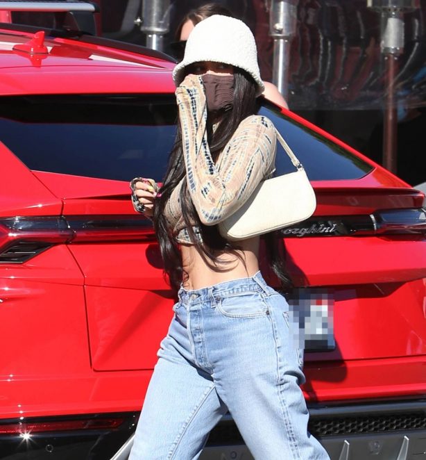 Kylie Jenner - In a crop-top and denim at 'Matsuhisa' Sushi Restaurant in Beverly Hills