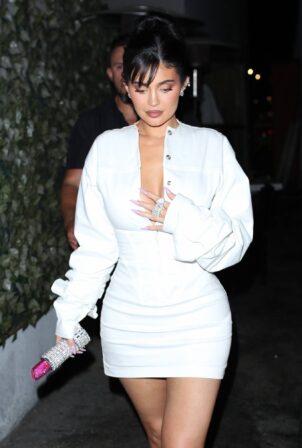 Kylie Jenner - In a white mini dress at Craig’s in Los Angeles