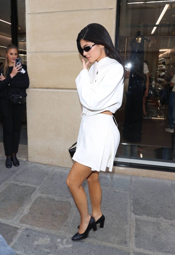 Kylie Jenner - In a white mini skirt leaving the Channel Store in Paris