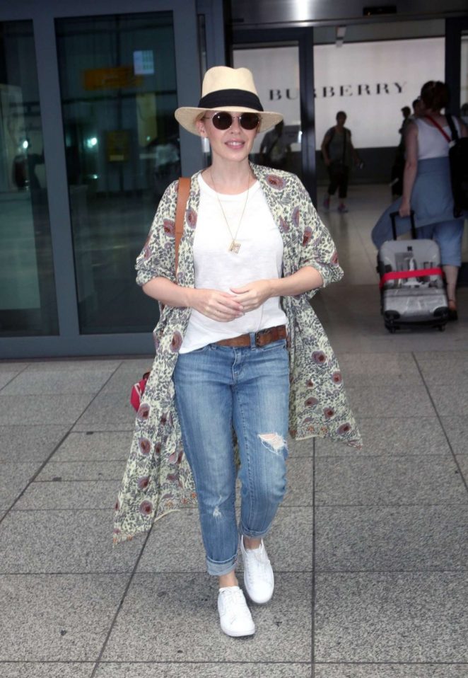 Kylie Minogue - Arrives at Heathrow airport in London