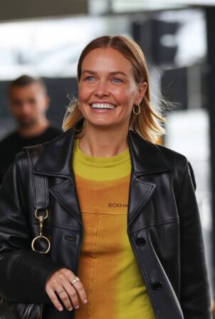 Lara Bingle - Pictured on arrival at Sydney International Airport Terminal
